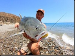 Jeff and a nice jack he caught on a popper